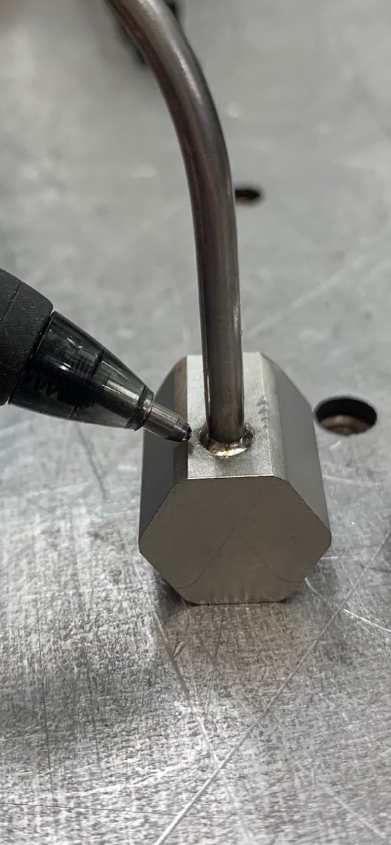 Leak-tight weld joining thin-wall tube to a hex fitting